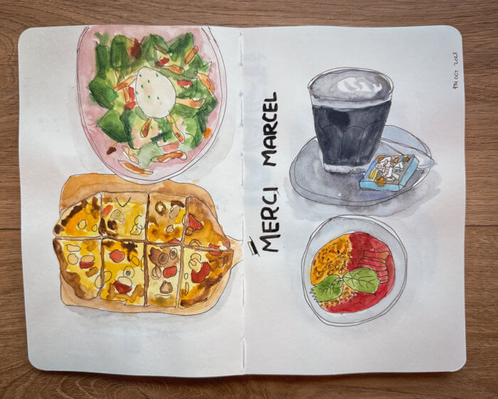 sketchbook spread of food consumed at merci marcel: pizza, salad, panna cotta and sesame latte