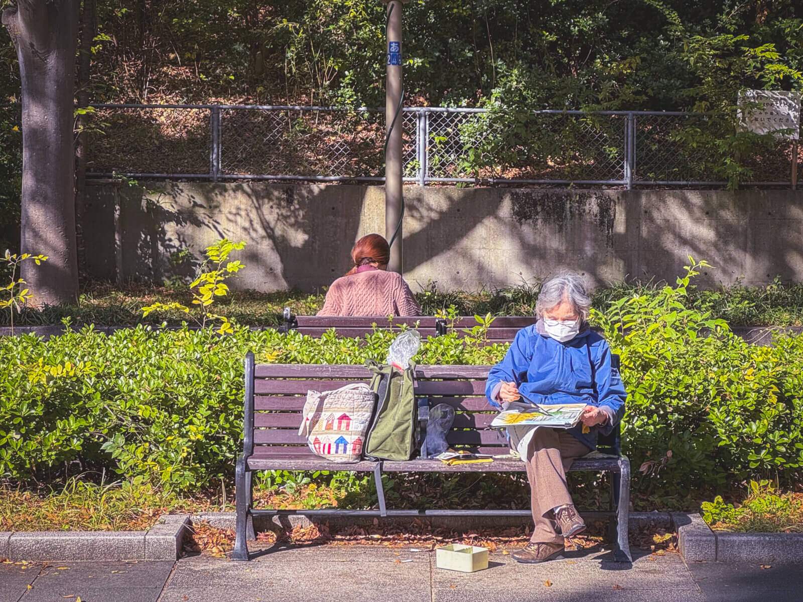 photo of someone painting in a park