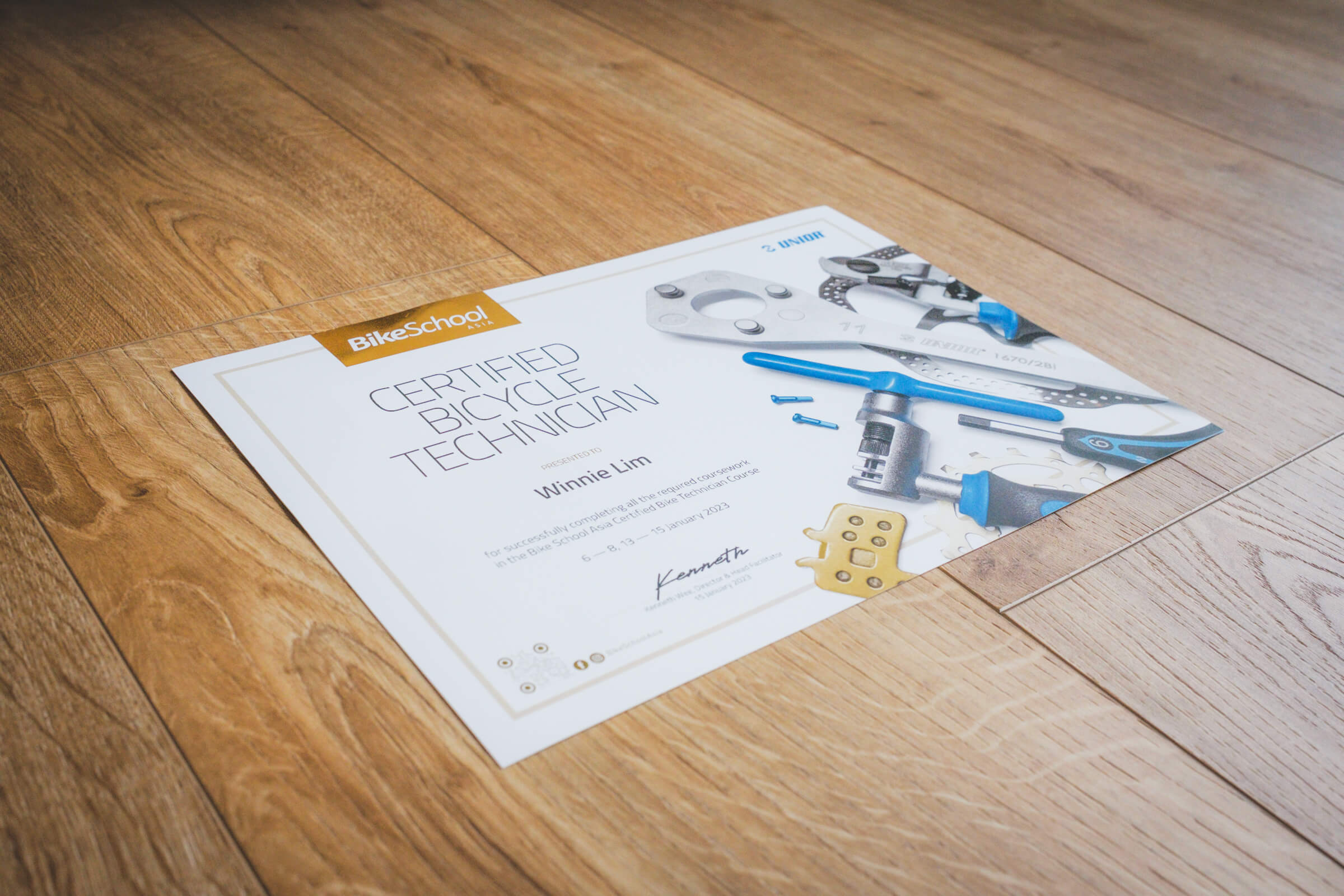 photo of a paper certificate for a certified bicycle technician