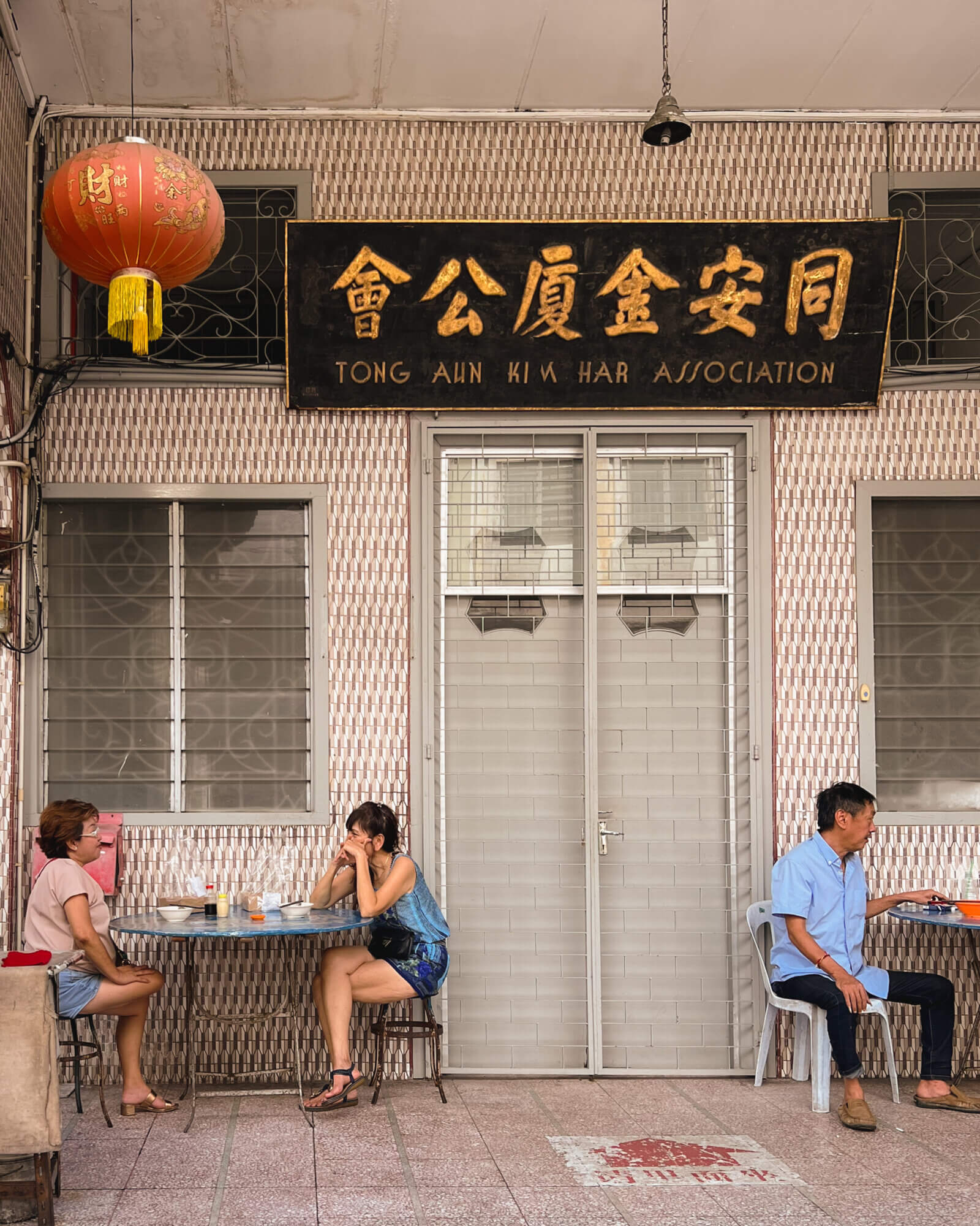 photo of people dining outdoors in penang