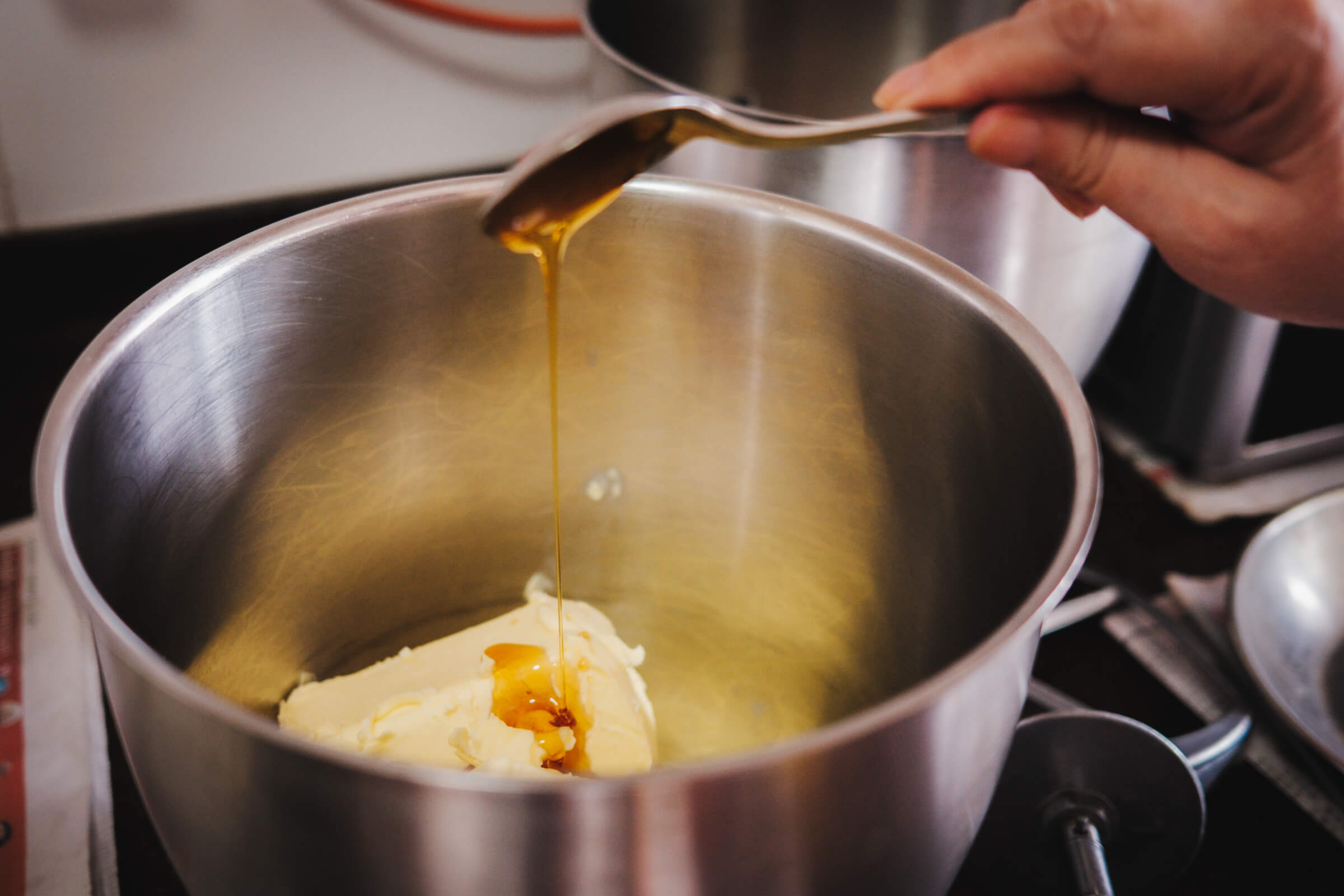 photo of my mom putting honey on butter