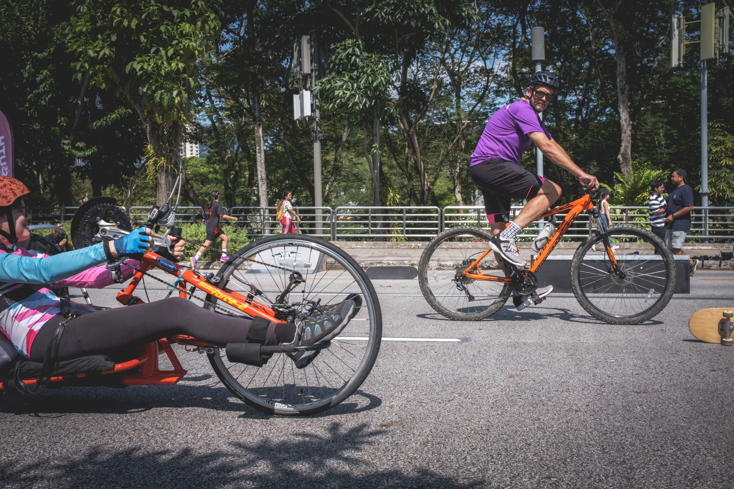 photo of different types of bicycles out on a car-free street