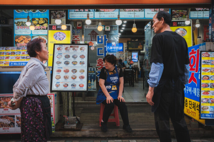 photo of different stall owners having a conversation