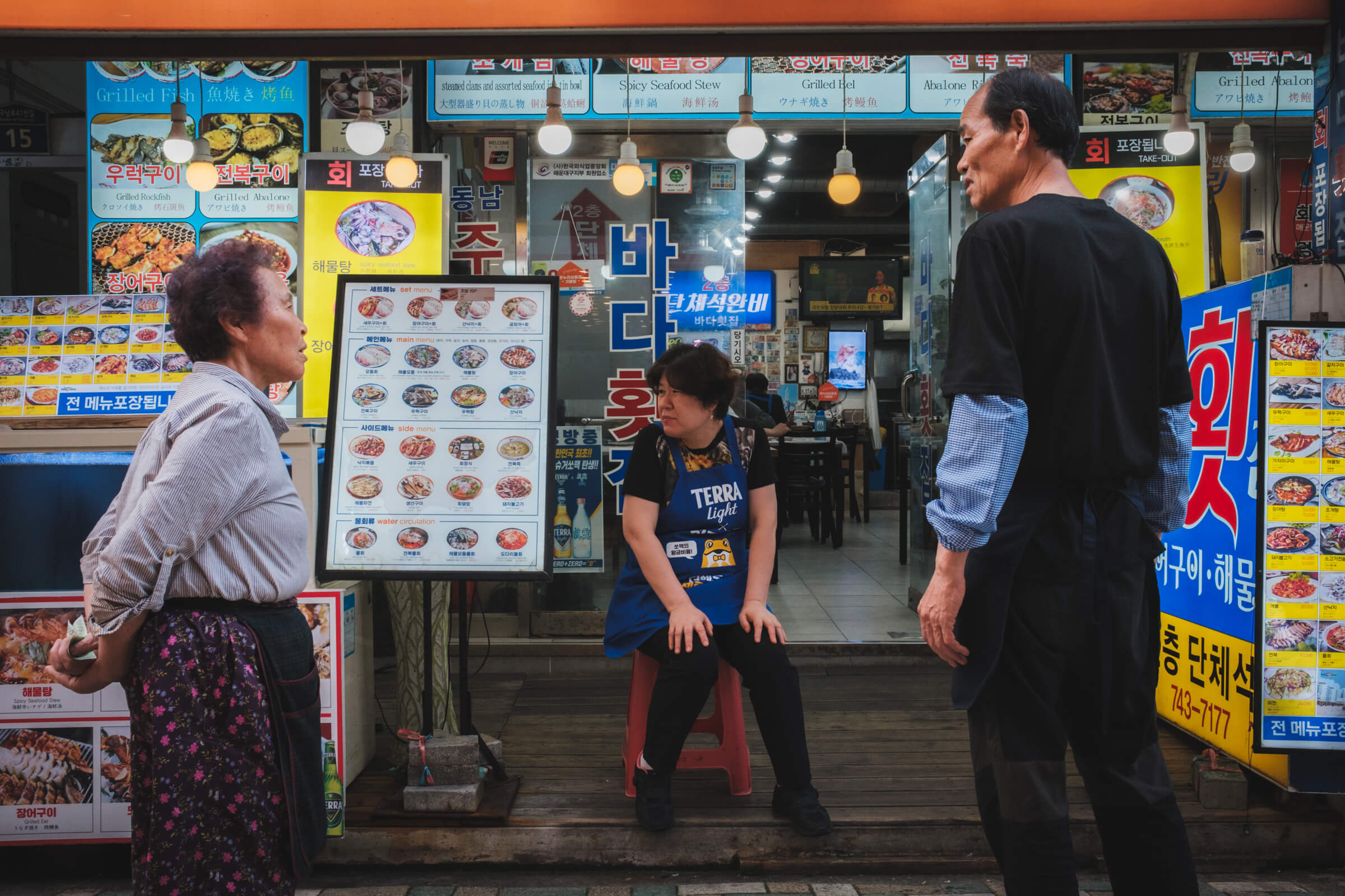 photo of different stall owners having a conversation