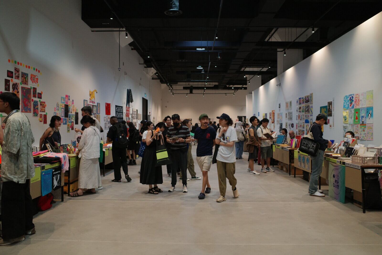 photo of the booths and people at the singapore art book fair