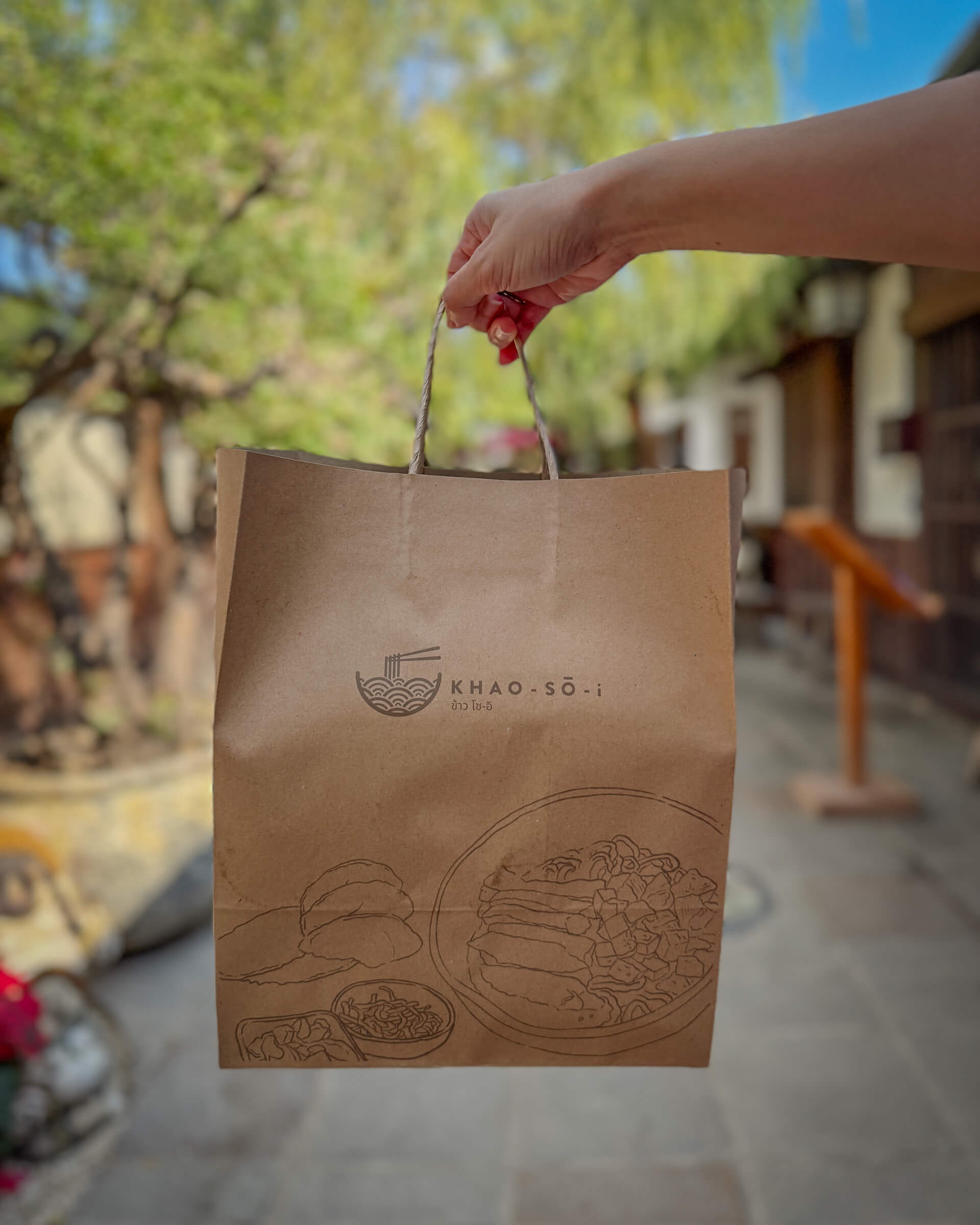 photo of khao soi-i's paper bag