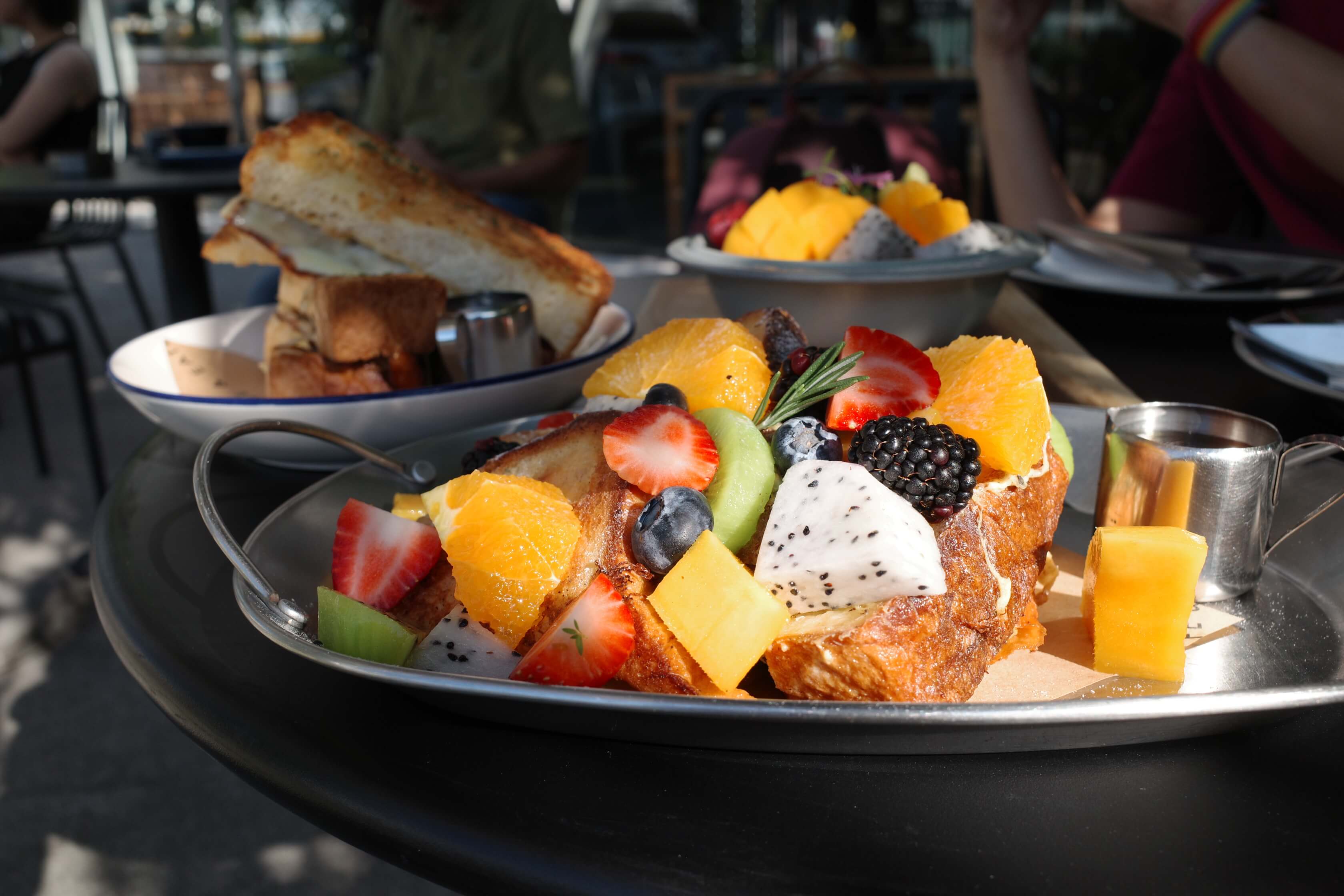 photo of fruits on breakfast plates
