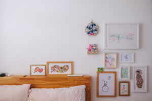 photo of my partner's art hung around our bed