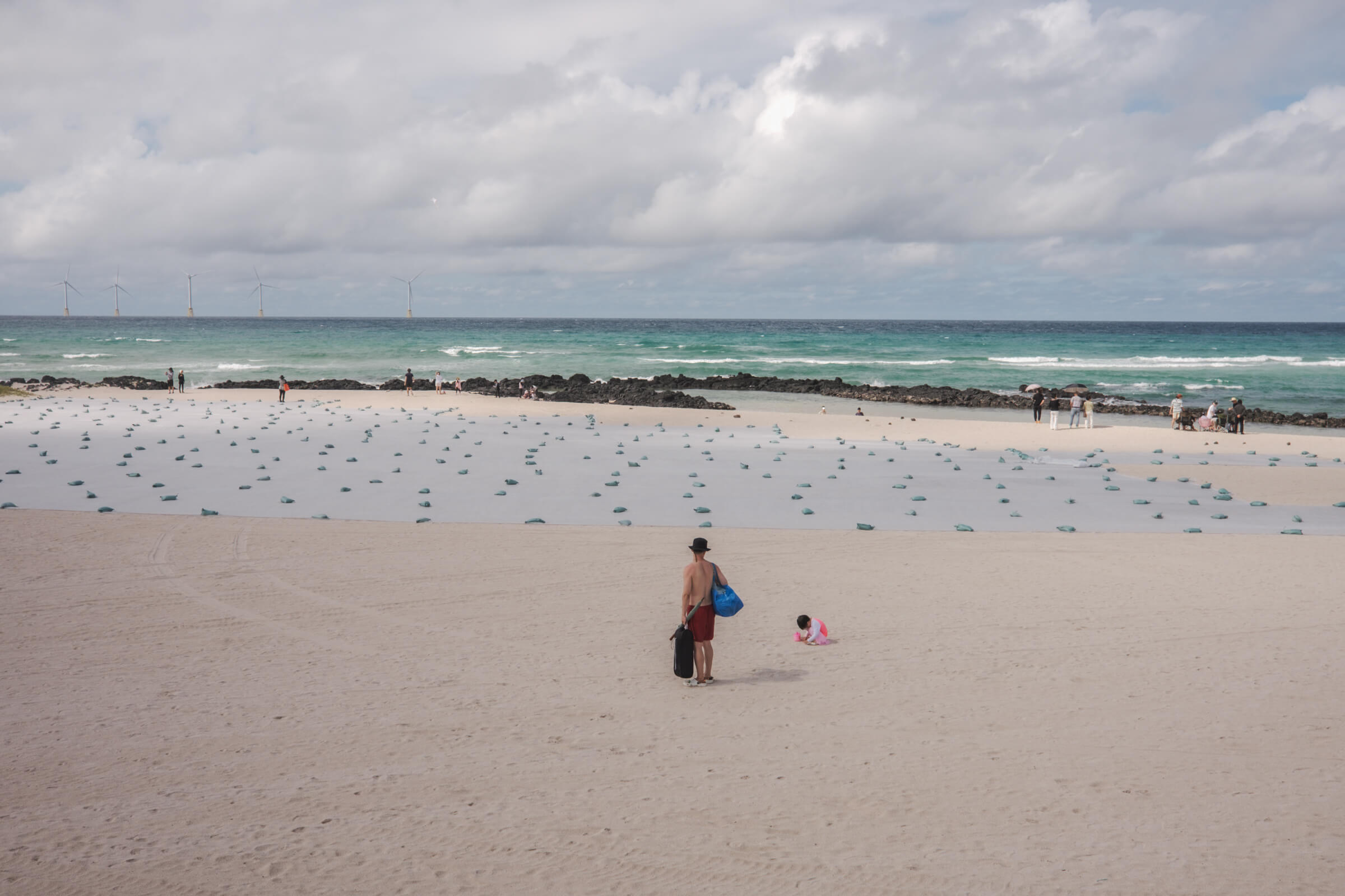 photo of someone waiting for a child at the beach